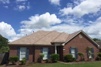 Alabama home with wind damage gets a roof replacement by Trotman Brothers.